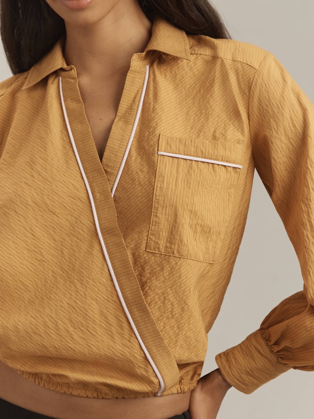 ANTHROPOLOGIE Maeve Mustard Wrap-Style Blouse with Soft Pink Piping